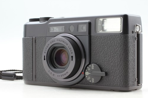 Fotocamera punta scatta - e,